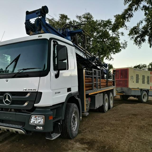 Branded Absolute Drilling truck ready for site work