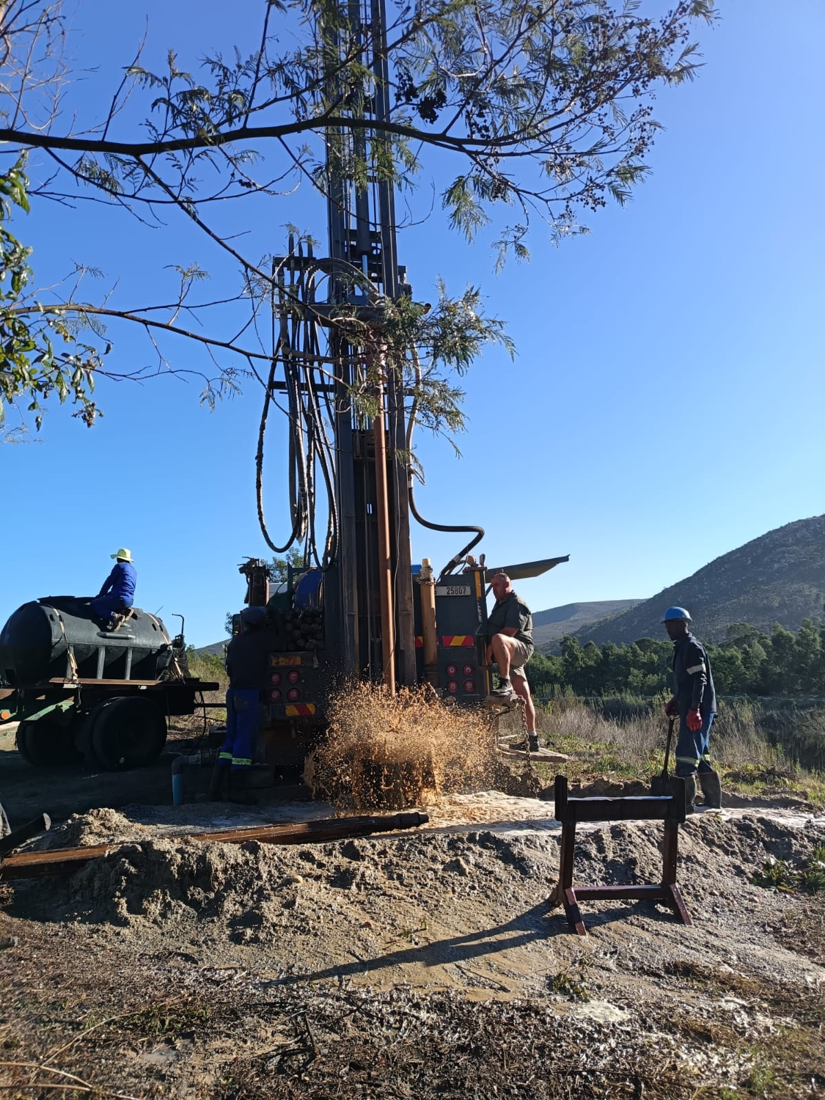 Absolute Drilling rig and team working on site